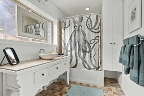 Eco-friendly toiletries, hair dryer, towels, soap