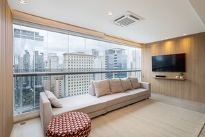 Apartment | Living area | TV - One Eleven Home and Work By Helbor (São Paulo)