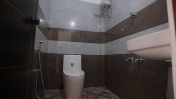 Shower, towels, soap, toilet paper