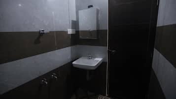 Shower, towels, soap, toilet paper