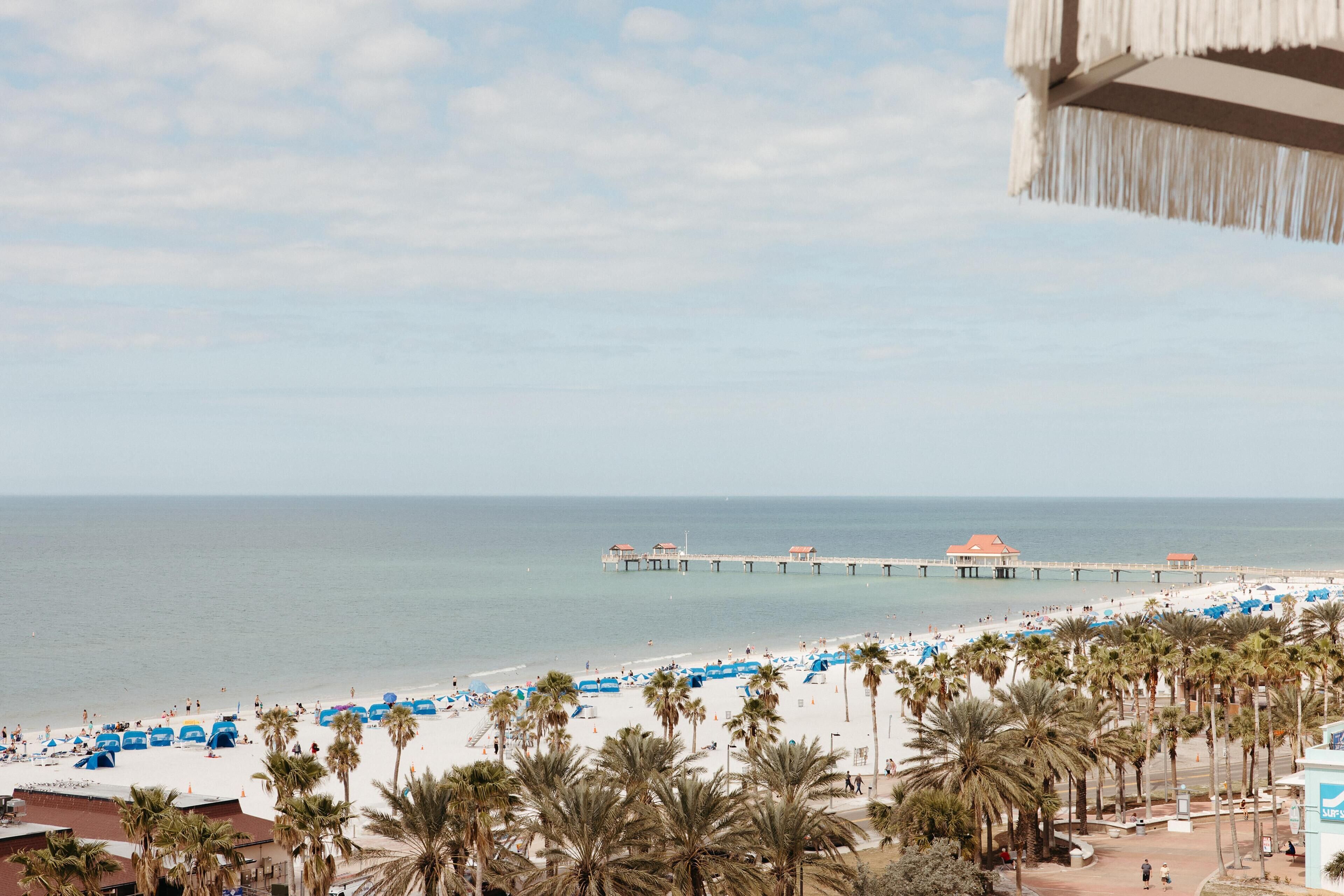 Beach nearby, white sand, beach towels
