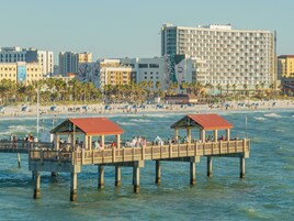 Beach nearby, white sand, beach towels