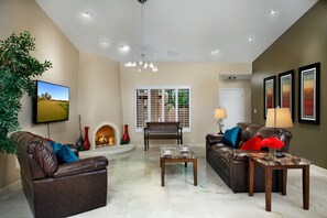 50-inch flat-screen TV with cable channels, TV, fireplace