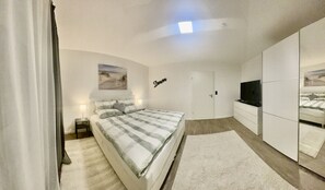 2 dormitorios, tabla de planchar con plancha, wifi y ropa de cama