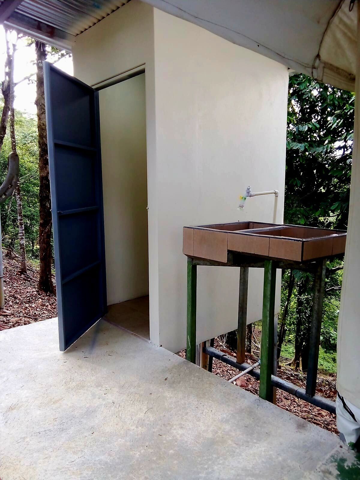 Luxury Tent W/ Exterior Connected Toilet Room & Shared Exterior Lockable Bathroom Across From Tent | Bathroom | Shower, towels, soap, shampoo