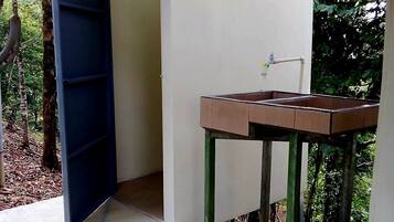 Luxury Tent W/ Exterior Connected Toilet Room & Shared Exterior Lockable Bathroom Across From Tent | Bathroom | Shower, towels, soap, shampoo