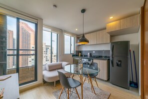 Appartement | Coin séjour | TV connectée de 40 pouces avec chaînes par câble