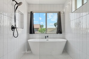 Shower, hair dryer, towels, soap