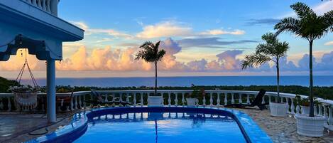 2 outdoor pools, open 8:00 AM to 9:00 PM, pool loungers