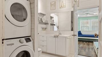 Hair dryer, towels, soap, shampoo