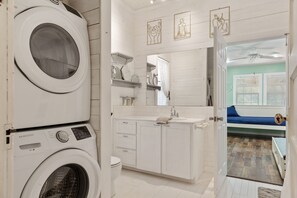 Hair dryer, towels, soap, shampoo