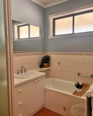 Shower, towels, soap, toilet paper