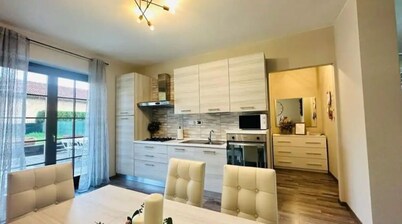 Cozy apartment with mountain view from back deck and fenced in yard.