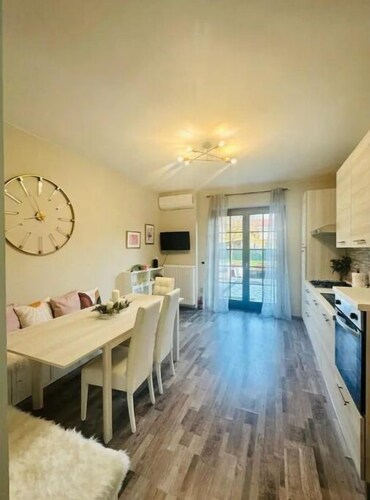 Cozy apartment with mountain view from back deck and fenced in yard.