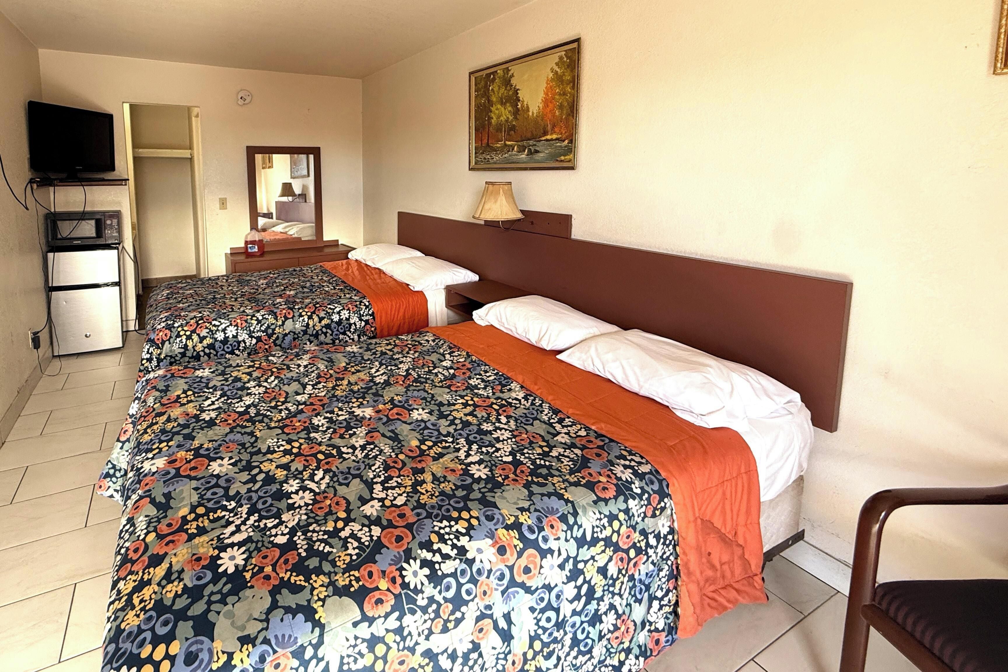 Room, 2 Queen Beds, Non Smoking | Individually furnished, free WiFi, bed sheets