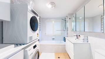 Hair dryer, towels, soap, shampoo