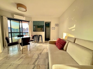 Comfort Apartment | Living area | TV