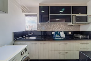 Apartment | Private kitchen | Fridge, microwave, stovetop, toaster