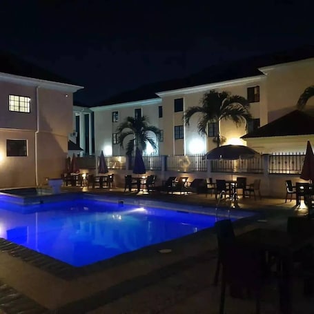 Outdoor pool. Impeccable Hotel by HomeVille Plus Benin