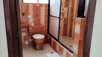Family Quadruple Room, Multiple Beds, Balcony, Garden View | Bathroom | Free toiletries, bidet, towels, soap