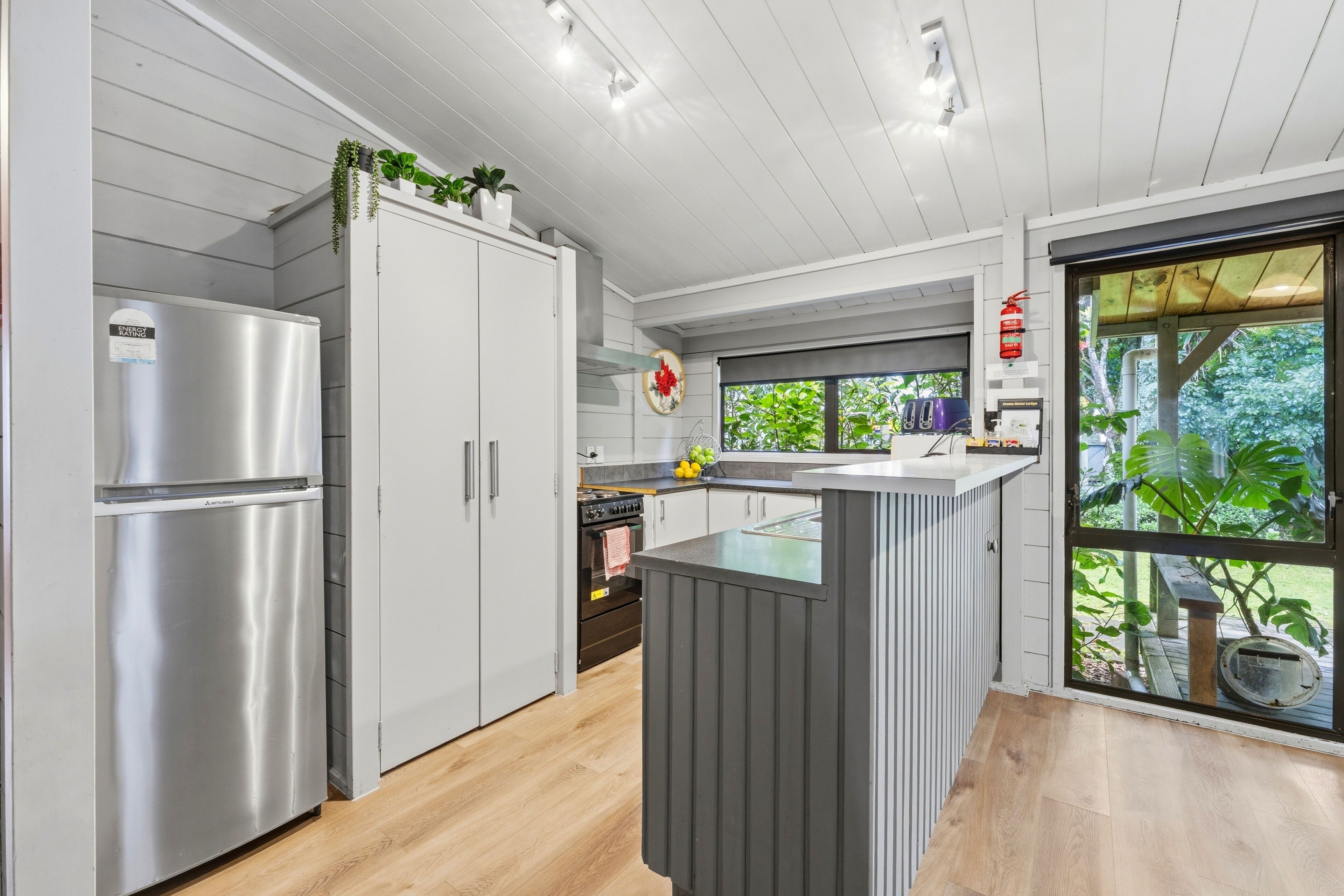 Family Bungalow | Private kitchen | Mini-fridge, oven, stovetop, electric kettle