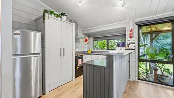 Family Bungalow | Private kitchen | Mini-fridge, oven, stovetop, electric kettle