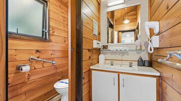 Shower, rainfall showerhead, hair dryer, towels