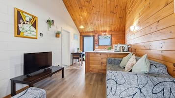 Comfort Suite, 2 Bedrooms, Ground Floor | Living area | 32-inch LCD TV with digital channels