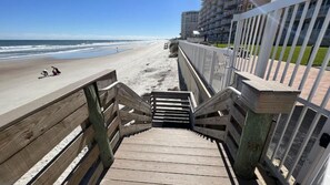 On the beach, sun-loungers, beach towels