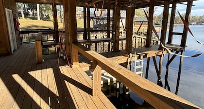 Newly remodeled lake front property with boat dock and oversized yard