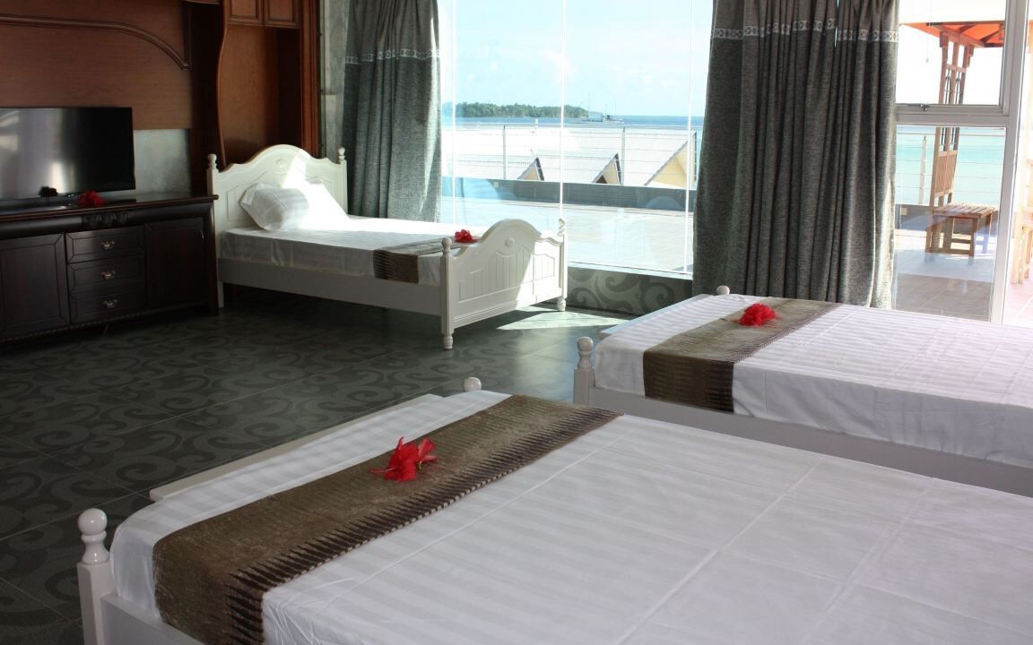 premium triple room | hypo-allergenic bedding, in-room safe, blackout curtains