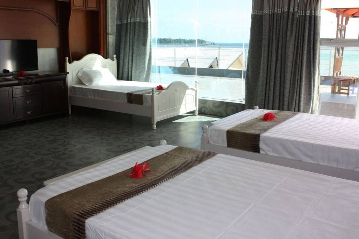 premium triple room | hypo-allergenic bedding, in-room safe, blackout curtains