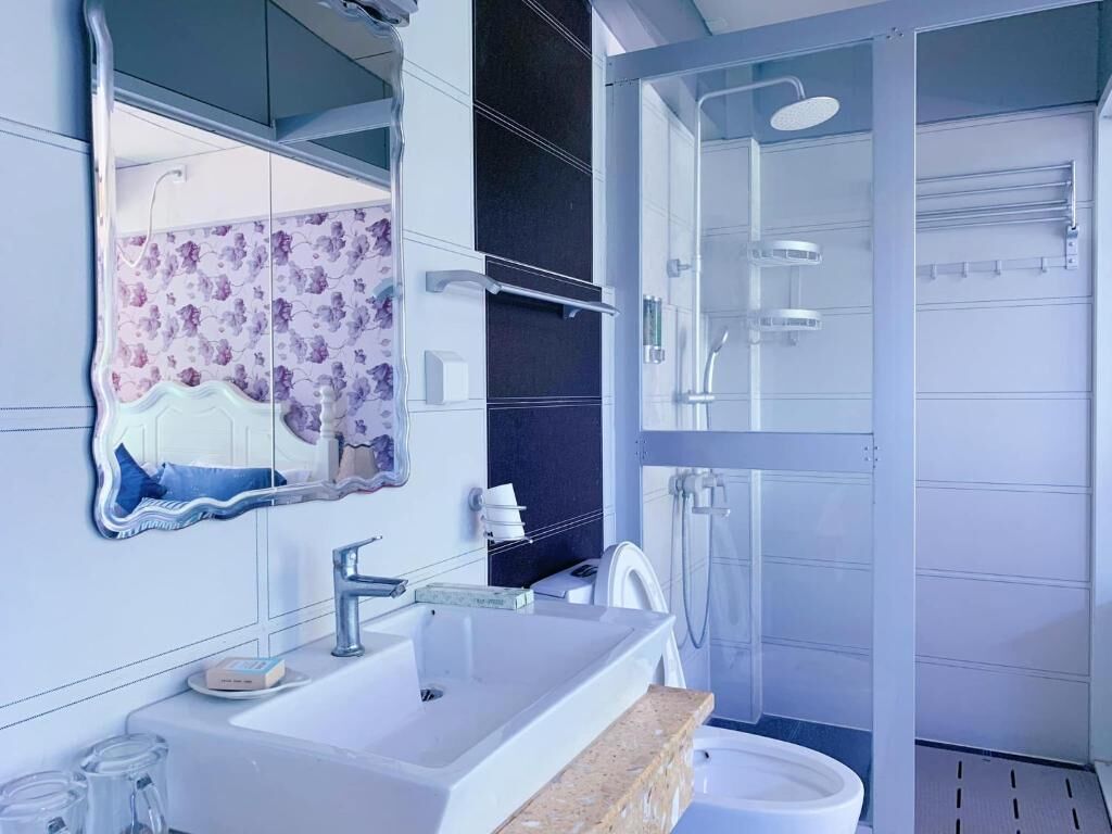 comfort double or twin room | bathroom | shower, hydromassage showerhead, free toiletries, dressing gowns