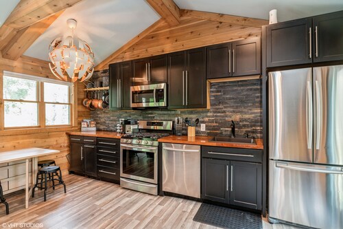  A cozy, modern cottage has all the amenities and privacy a hotel cannot offer.