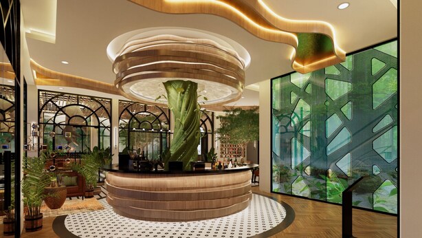 A modern reception area with a central wooden reception desk, a large green plant, and a wall with a geometric tree pattern. - Posto Dormire Benhil (Jakarta)