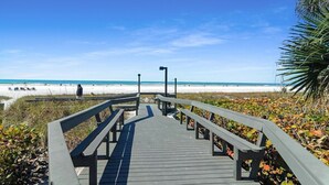 A wooden boardwalk leading to a beach with clear skies. - Charming Siesta Key Condo With Beach Access - GBB 1318 (Siesta Key)