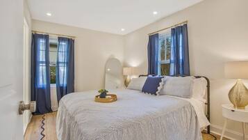 2 bedrooms, desk, iron/ironing board, travel crib