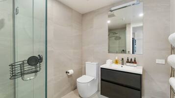 Shower, hair dryer, towels