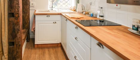 Fridge, electric kettle, toaster, cookware/dishes/utensils