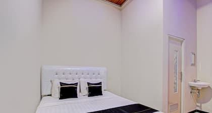 Capital O 93244 Angkasa Inn