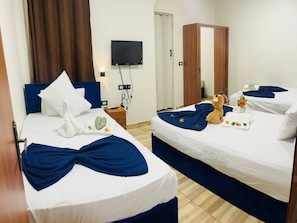 Deluxe Triple Room | Egyptian cotton sheets, premium bedding, memory foam beds, soundproofing