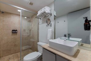 Shower, hair dryer, towels, soap
