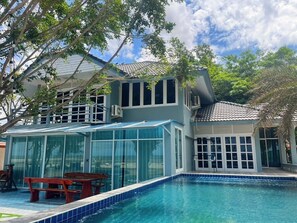 Four-Bedroom Villa - Beach Front | Living area | Flat-screen TV - Chang Phueak Chao Samran Beach (Phetchaburi)