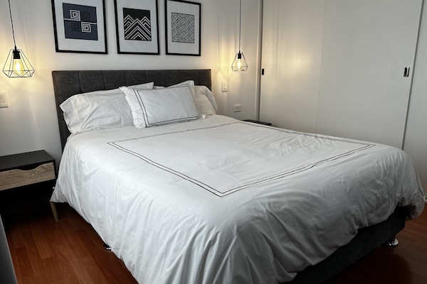 Apartamento empresarial, 1 cama Queen, serviço de arrumação, no andar executivo | 1 quarto, roupas de cama de algodão egípcio, roupas de cama premium