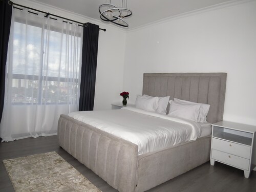 Luxurious 3 bedroom apartment with a pool, a gym and an amazing rooftop view.