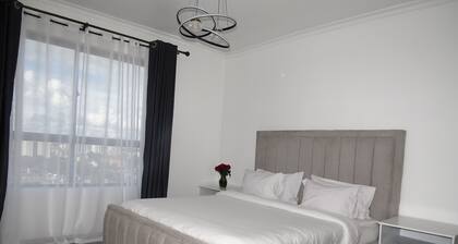 Luxurious 3 bedroom apartment with a pool, a gym and an amazing rooftop view.