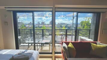 Twin Room, with Kitchen and Washing machine, Non Smoking | Living area | Flat-screen TV