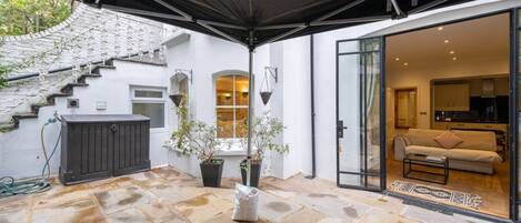 Appartement, plusieurs lits | Terrasse/Patio