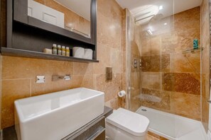 Basic Apartment, Multiple Beds | Bathroom | Shower, hair dryer, towels, soap