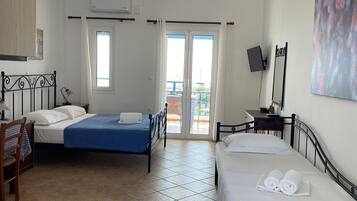 Basic Triple Room | Blackout drapes, soundproofing, free WiFi, bed sheets